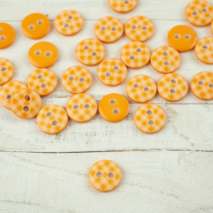 Kunststoffknopf mit Karomuster klein - lachs