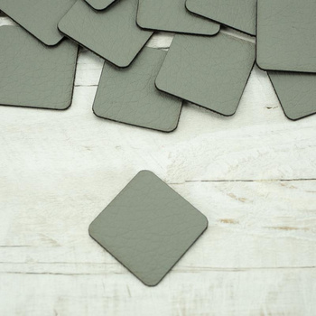 Pads under the eyelets Leatherette label small square - grey