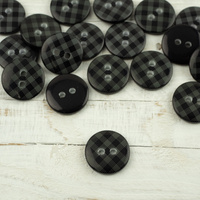 Plastic button with check middle - black