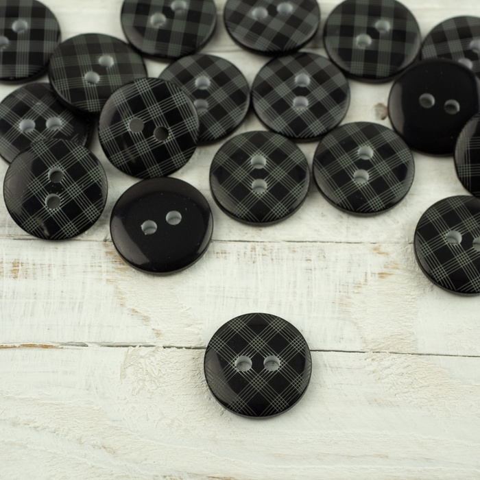 Plastic button with check middle - black