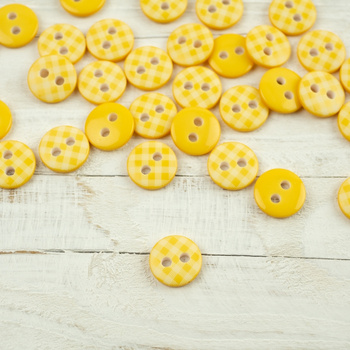 Plastic button with check small - yellow