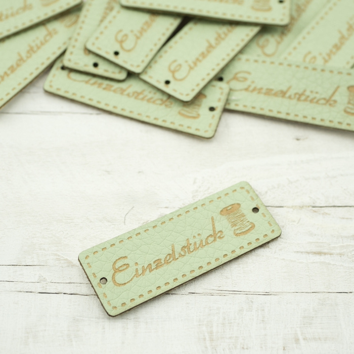 Einzelstück  label - bobbin 1,5x4cm - mint