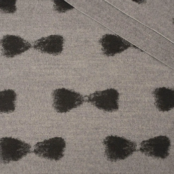 <p>Duffle fleece is a woven fabric with diagonal, closer and tight sett. It is visibly thick, covered with pile and at the same time pleasantly soft.</p>
<p>The fabric does not stretch. The spandex used in the composition is to help keep the form of sewn 