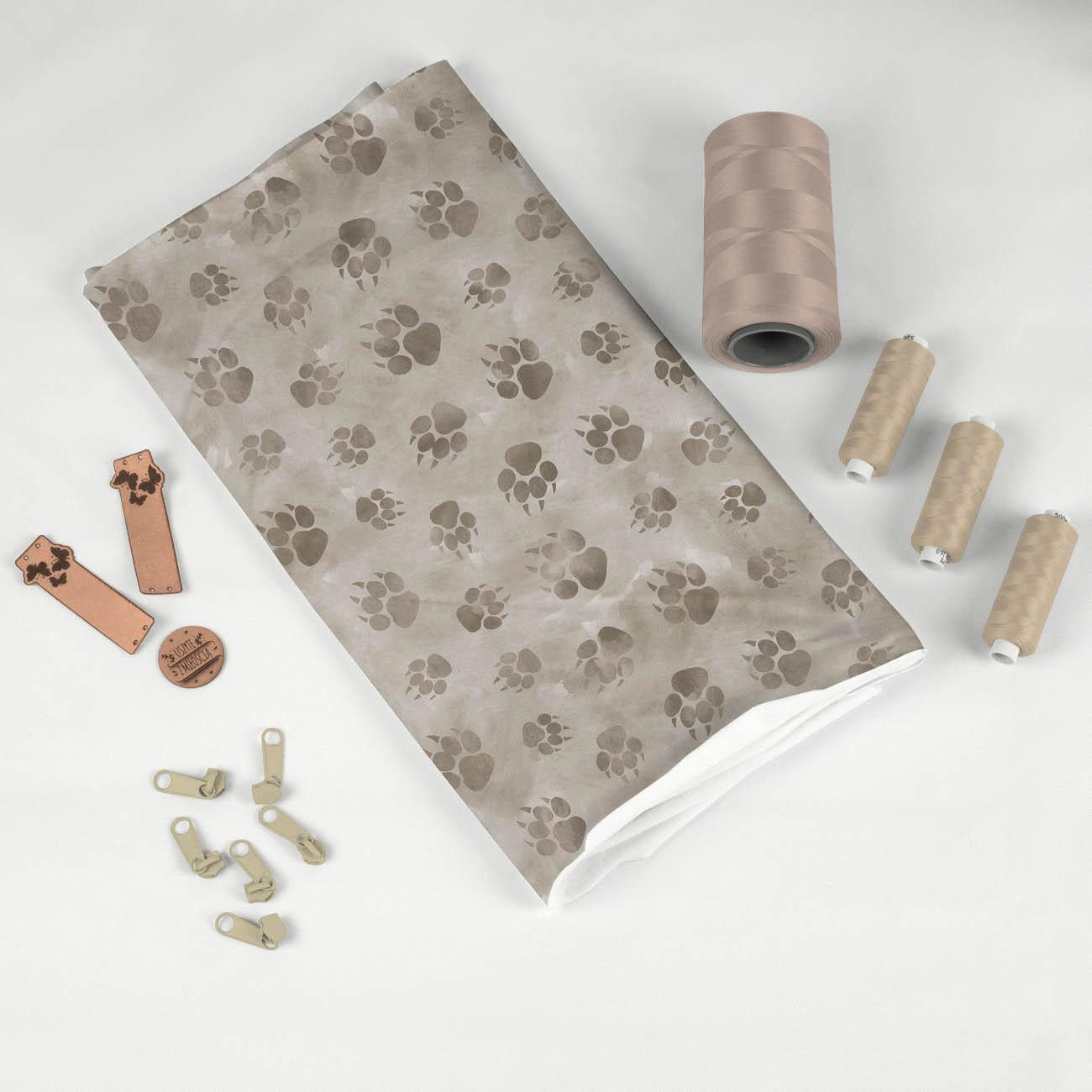 PAW PRINTS / BEIGE (SNOW LEOPARDS) - looped knit fabric