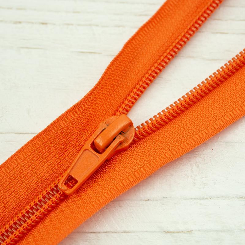 Spirálový zip 25cm dělitelný - oranžový