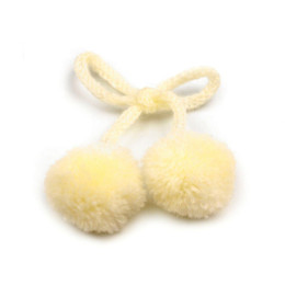 Pompons on a string sunny yellow