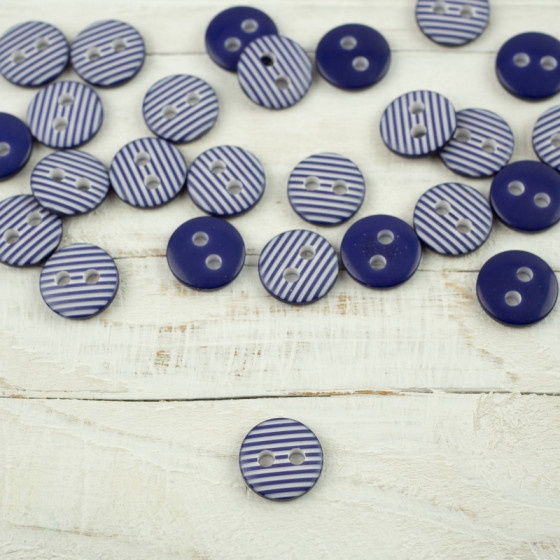 Plastic button with stripes small - cornflo