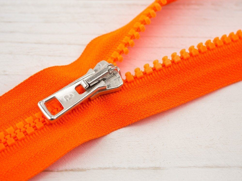 Kostěný zip 60cm dělitelný - neon oranžový