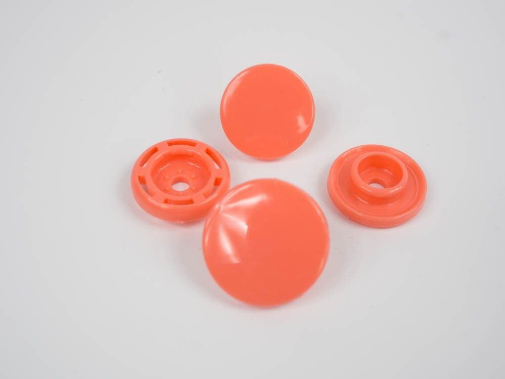 Patentky KAM, plastové západky  14mm - lososové 10 sad