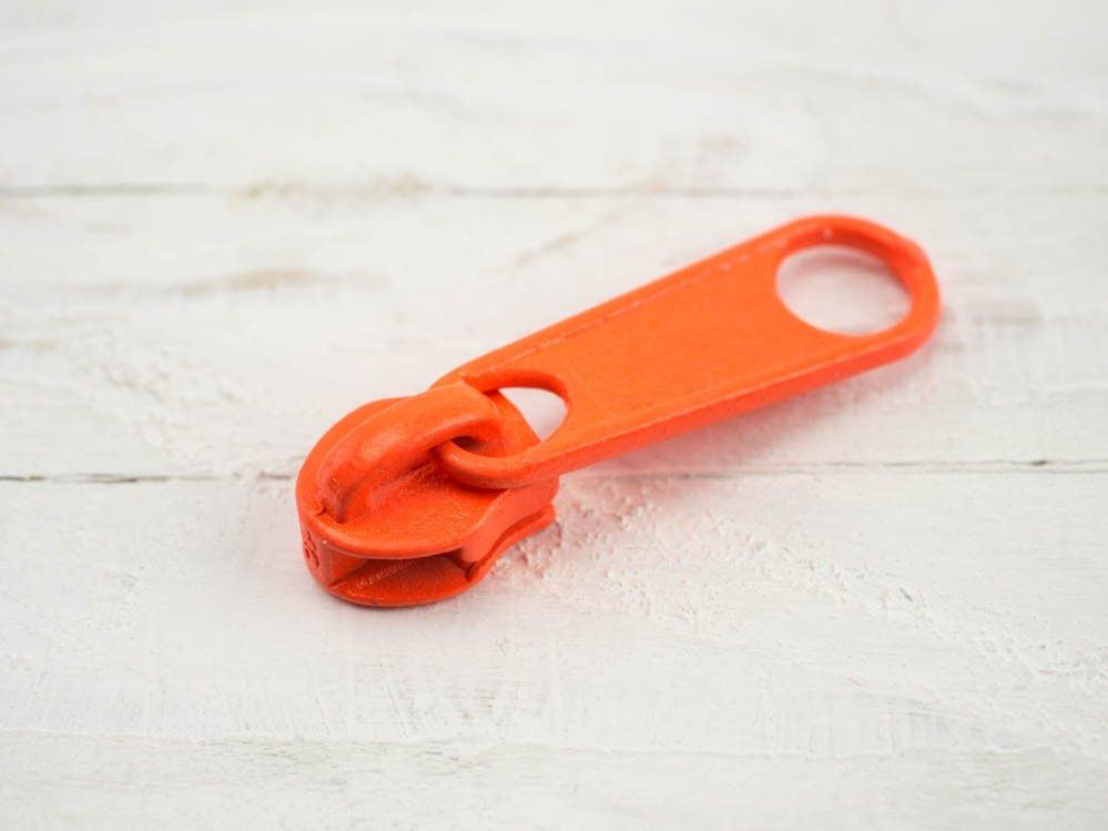 Jezdec ke spirálovým zipům 5mm - neon oranžový 1002