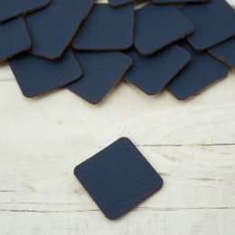 Pads under the eyelets Leatherette label small square - dark blue